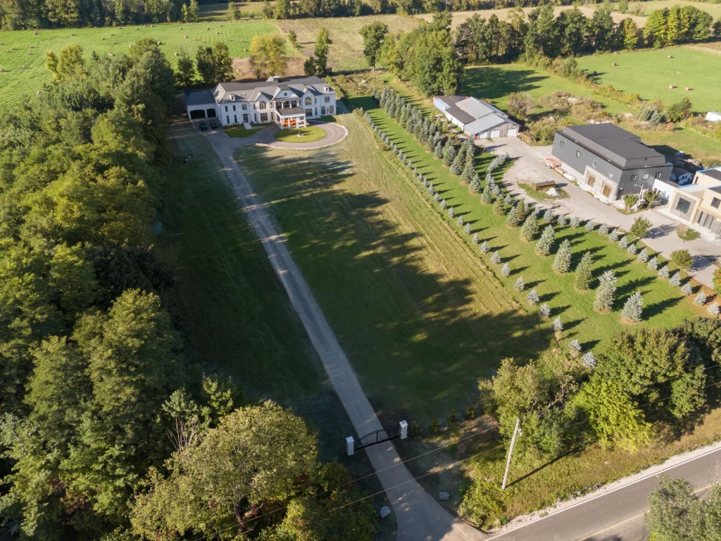 Aerial view of a property and its surrounding land