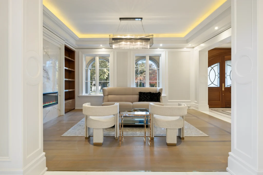 Open-plan living room photographed with blended exposures, the windows correctly exposed